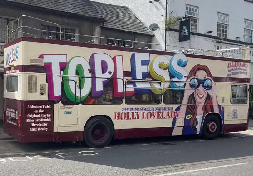 "Topless - The Musical" in the open-top deck of a hop-on hop-off bus